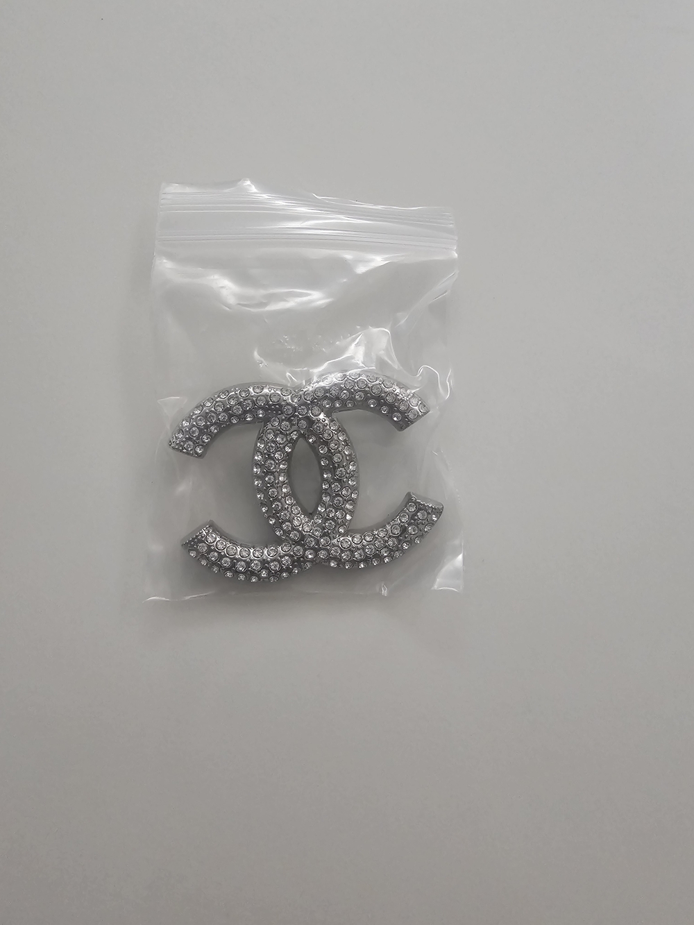 Crystal Interlocking Logo Brooch - Silver
